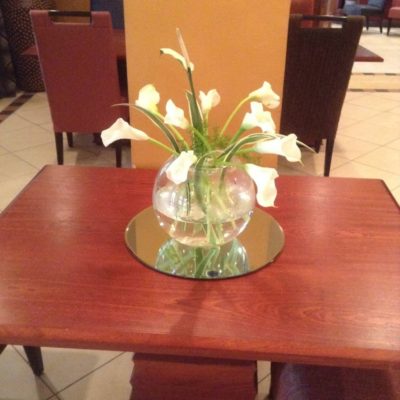 Calla lilies in fish bowl
