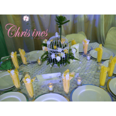 Guest tables with birdcage centerpiece