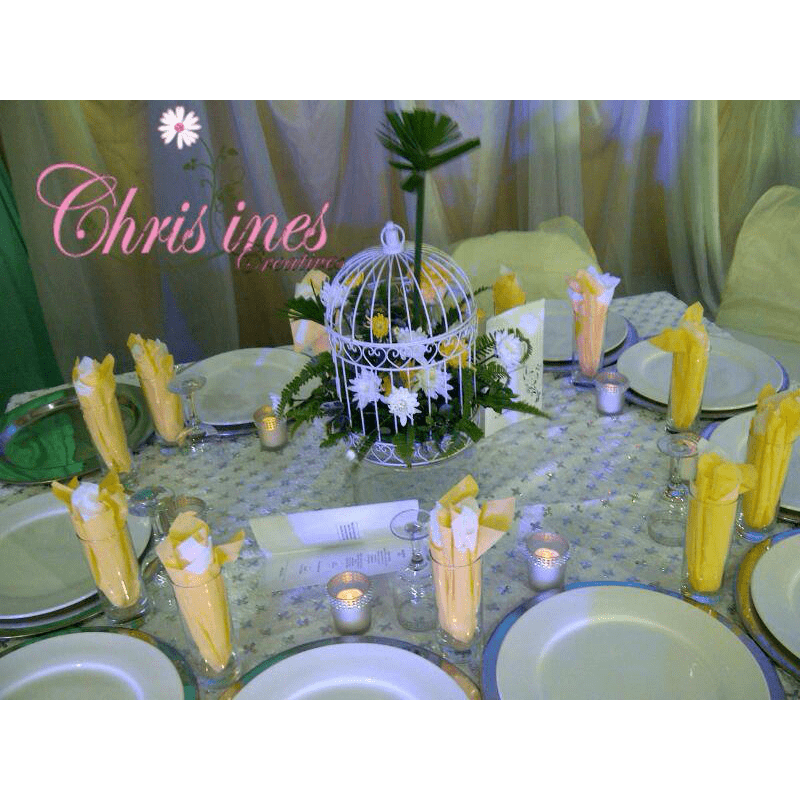 Guest tables with birdcage centerpiece