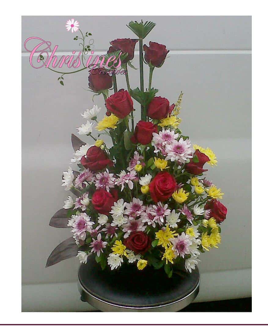Red roses and purple/yellow chrysanthemums