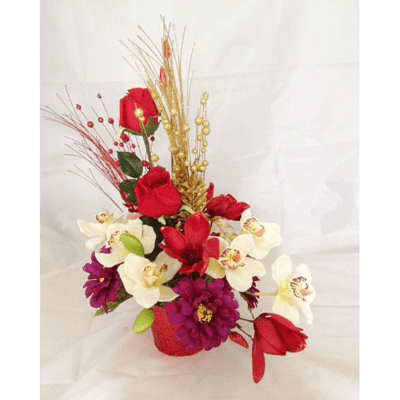 red artificial flower arrangement